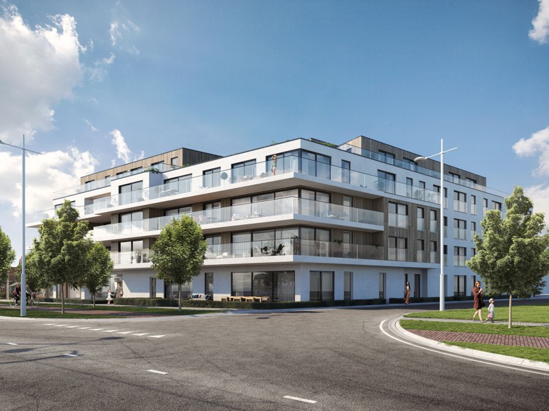 Moderne residentie met glazen balkons en groene omkadering in Nieuwpoort.